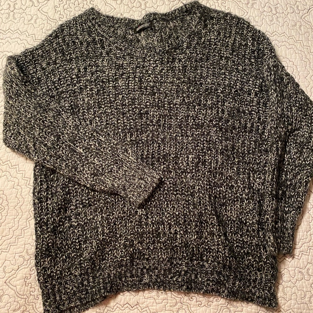 Oversized black/white pullover sweater, fits XL.